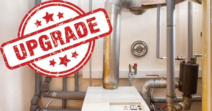 Image of a oil heating system with the words "Upgrade".